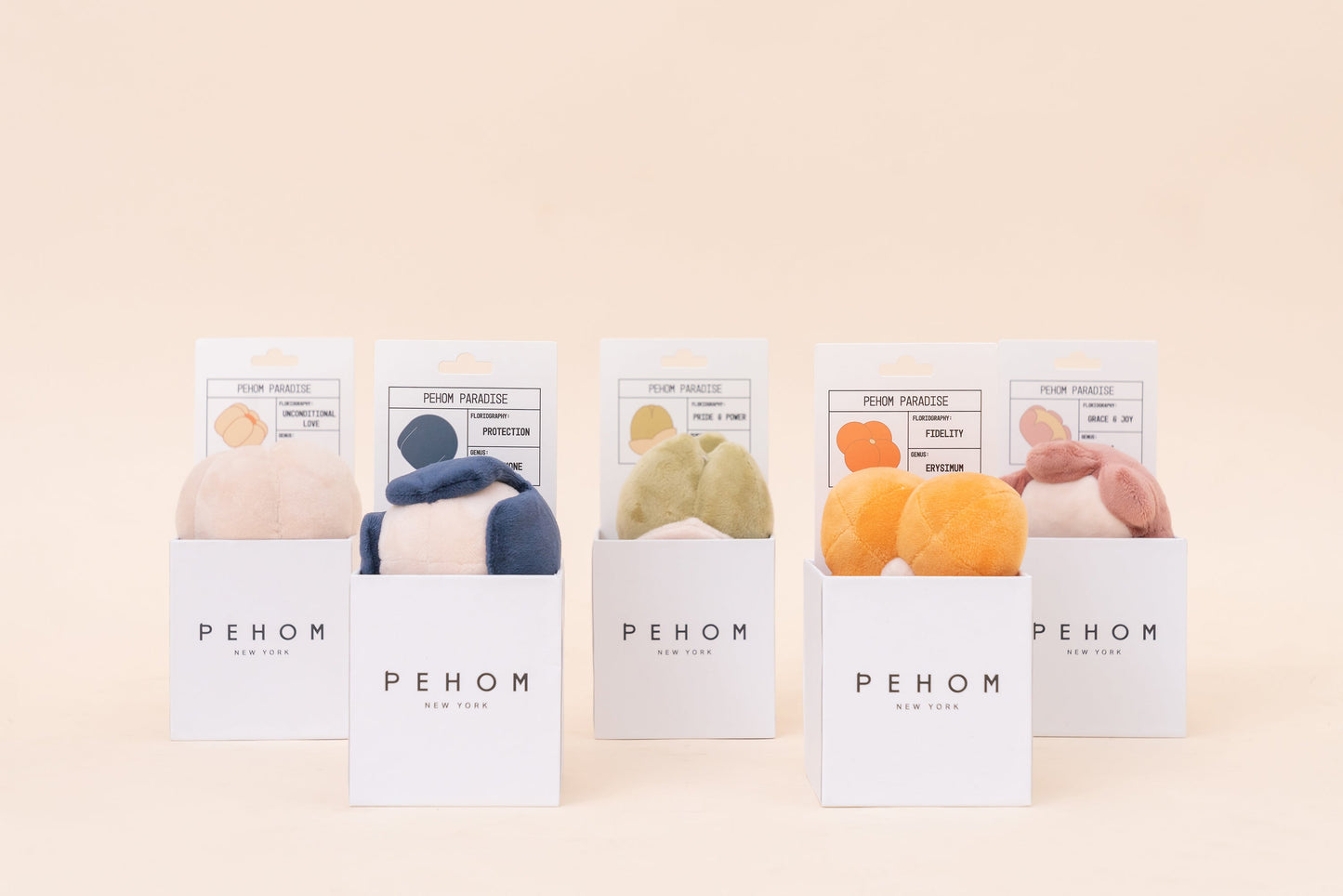 Five packages of PEHOM products on a beige background