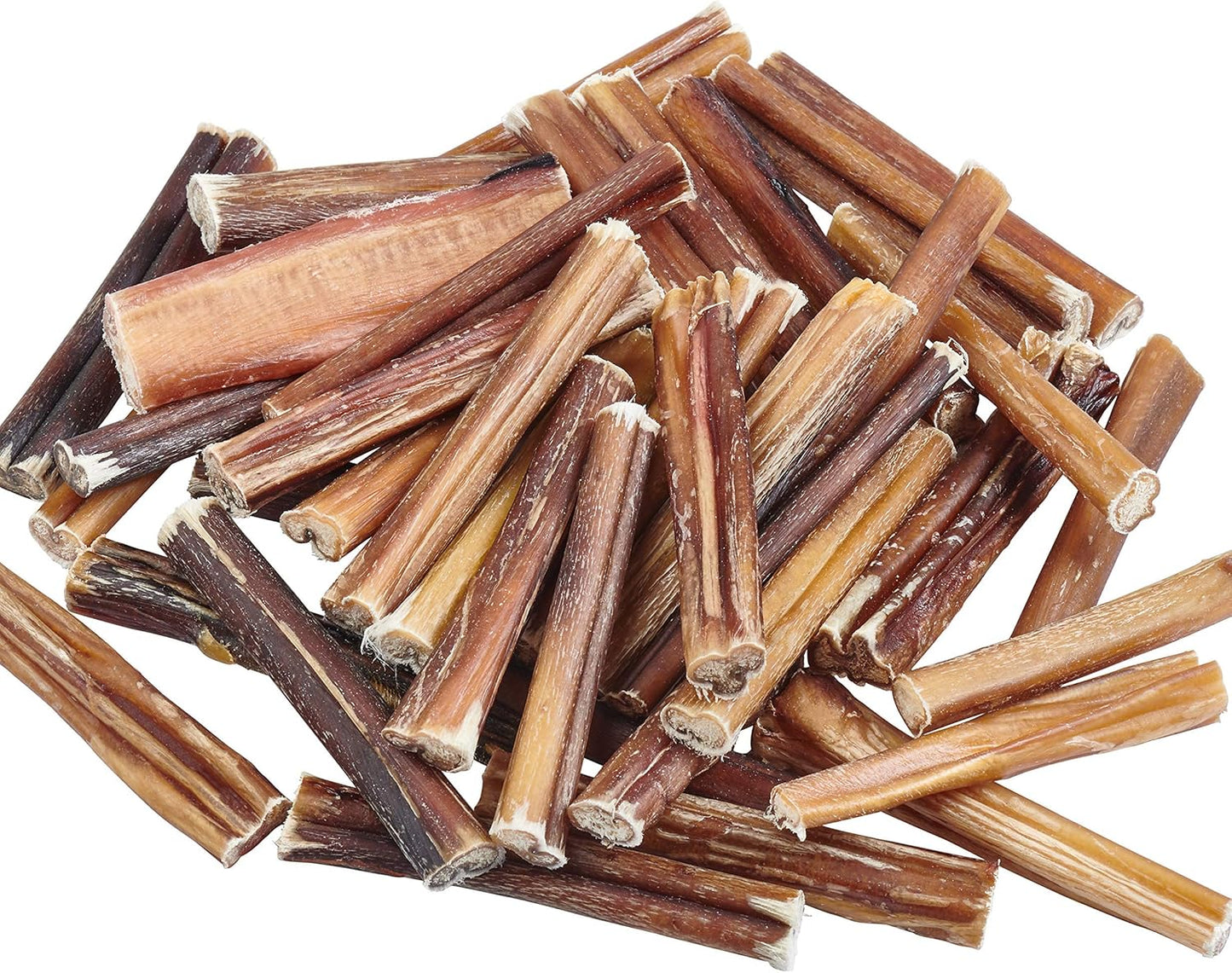 Pile of dog chew sticks on a white background