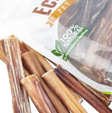Dog chew sticks with 'Eco Pet' packaging highlighting '100% natural' and 'no preservatives' on a white background.
