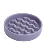 Purple textured pet bowl on a white background